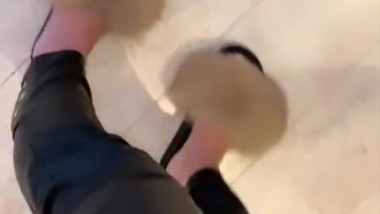 Leather pants and fur sandals.