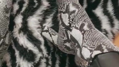 Leather pants, heels and snake leather.