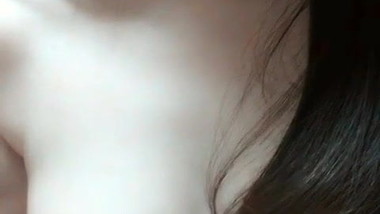 Korean cute playing with her boobs