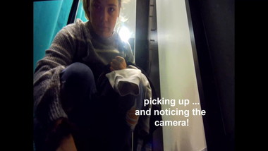 Young Girl Cabin room in shopping mall noticing hidden cam