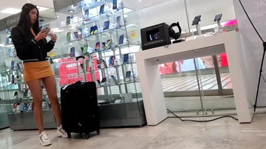 beautiful young woman in miniskirt