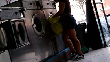 Cute Latina teen with a phat ass at the laundromat