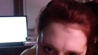 Redhead sucking cock