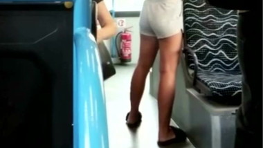 Candid girl ass in short on the bus