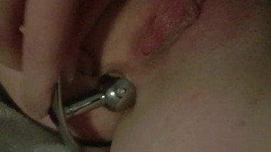Pierced Slut plays with Buttplug