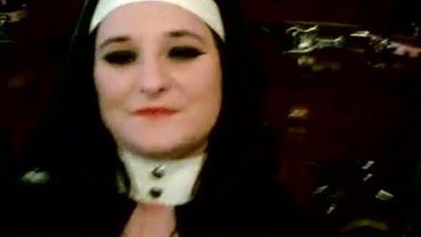 Rubber nun sucks cock