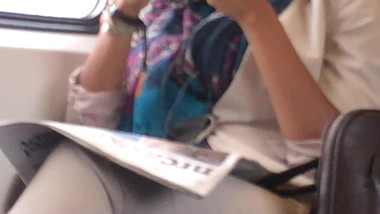 girl sitting on train unnoticed