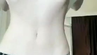 Teen shows off her huge tits