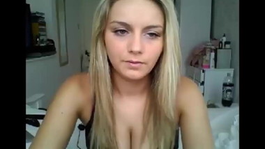 Blonde beauty strips down