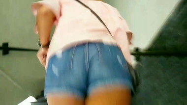 Tanned Asian Teen in Cheeky Shorts